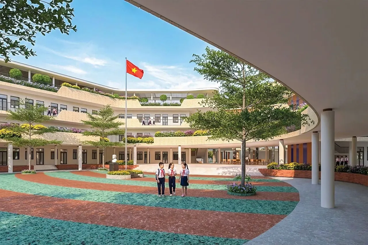 Phối cảnh sân trường với cột cờ Việt Nam và học sinh tại cụm công trình giáo dục ở Sun Neo City